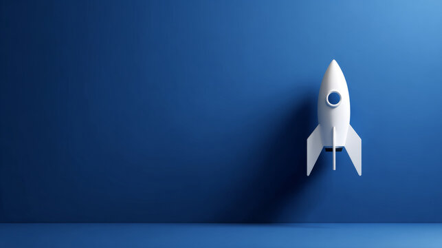 A white rocket ship with a blue circular window on its side, floating in space against a bright blue background - Powered by Adobe