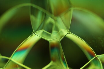 Green liquid surface, phenomenal structure, green oils on a dark background, colourful abstract, surrealistic art, iridescent effect