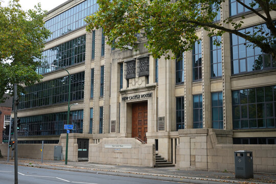 New Castle House, A Distinctive Modern Architectural Building With Stone Facade And Reflective Glass Windows, Located In Nottingham, England