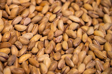 Pistachio background. Salted nuts. Top view, background, or wallpaper for nut advertising