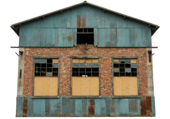 Isolated old warehouse structure, abandoned factory exterior, weathered ruin, derelict building