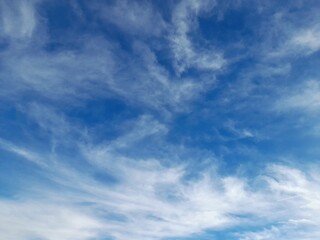 Blue Sky with White Cirrus Clouds Background