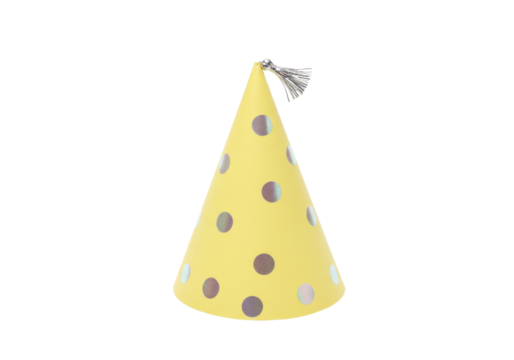Isolated shiny polka dot party hat with tassel, a bright yellow celebration and festive item