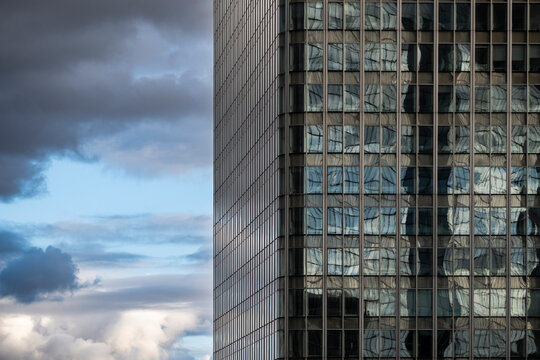 Architecture skyscraper facade reflection finance business corporate modern glass building paris shaping a dynamic visual narrative for contemporary financial identity
