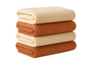 Stacked soft fleece blankets and throws, beige and brown, providing comfort, warmth, and cozy home textiles