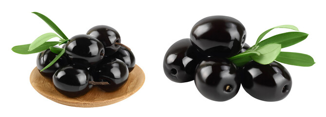 Black olives with leaves in wooden bowl isolated on a white background with full depth of field.