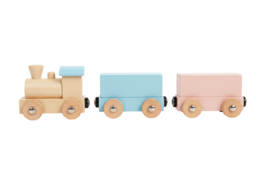 Isolated wooden toy train locomotive pulling blue and pink wagons, bright and colorful toys