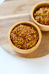 Wholegrain mustard seeds in brine