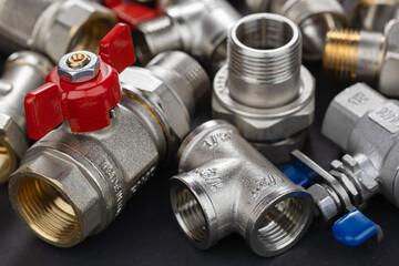 water ball valve with connecting fitting, on dark background, Threaded connection American