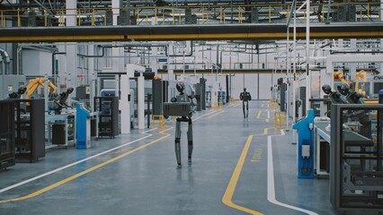 Automated Logistics Robots Transporting Cargo Cases in Production Plant. Multiple Robots Engaged in Automated Logistics, Carrying Cargo Cases Along Marked Lanes. Unmanned Transport and Efficiency.