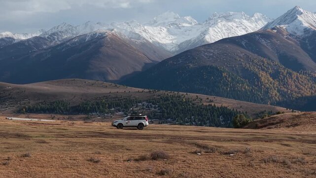 Overlanding SUV in Remote Alpine Mountain Landscape