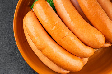 Sausage meat pork or chicken meat fast food natural tasty appetizer fresh delicious gourmet food background on the table rustic top view copy space