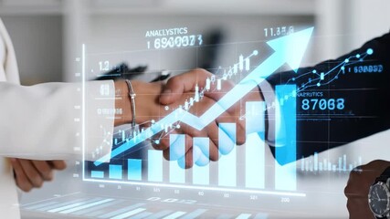 Corporate partners shaking hands after a successful agreement, with a digital overlay showing a holographic chart of financial growth, rising stock market data, and positive analytics - Powered by Adobe