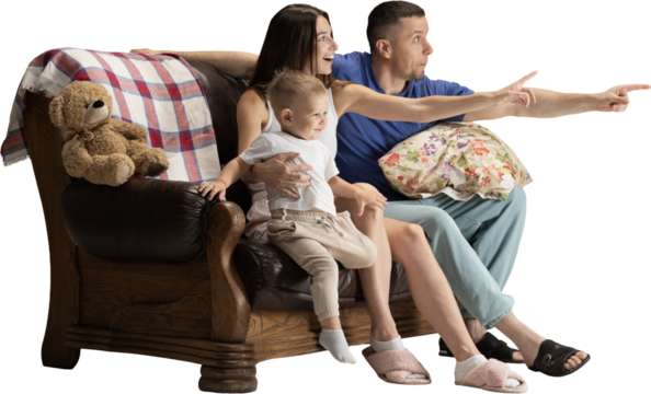 Happy family sitting on sofa and pointing forward with joyful emotions on transparent background. Concept of family lifestyle, parenting visuals, home comfort, advertising scenes and warm storytelling