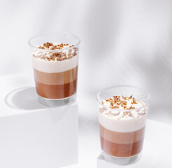 Delicious layered dessert served in clear cups at a trendy cafe