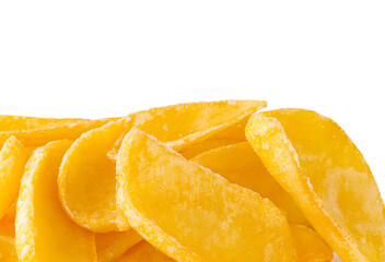 Crispy yellow potatoes snacks piled together in a bright setting