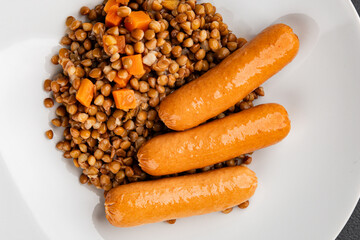 Lentils with sausage second course quick meal natural tasty appetizer fresh delicious gourmet food background on the table rustic top view copy space