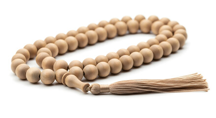 Natural wooden prayer beads with tassel on a clean white background, symbolizing peace and meditation.