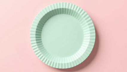 Minimalist plate design in soft mint color on pastel pink background, perfect for modern dining aesthetics