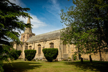 Obraz premium The Church of St Lawrence is situated in the village of Warkworth in Northumberland. It is a grade I listed building within the Diocese of Newcastle and dedicated to St Lawrence of Rome.