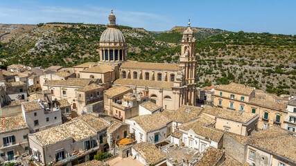 Obraz premium Aerial view of the dome and side of the Cathedral of San Giorgio, located in the historic center of the old town of Ragusa Ibla, Sicily, Italy. It is an example of Sicilian Baroque architecture.