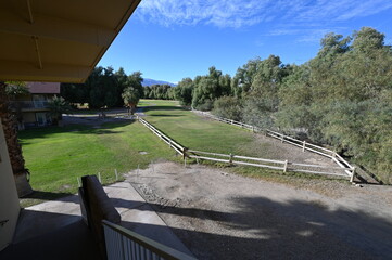 Looking down at a Golf Course Green from a Balcony in California.