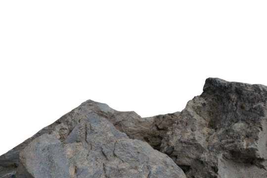 Close-up of weathered, grey rock formations, possibly mountain peaks, with a sharp, irregular outline against a stark black void above. Rugged natural texture
