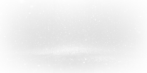 Obraz premium Gentle snowflakes fall silently against a transparent backdrop, evoking a tranquil winter scene. This serene moment captures the beauty of snowfall in a cozy environment.