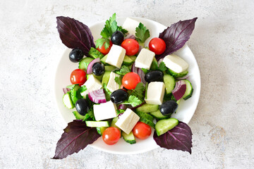 Fresh Greek Salad with Feta, Olives and Purple Basil flat lay