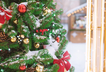 Festive pine tree decoration captured with a cozy, bokeh-filled Christmas background.