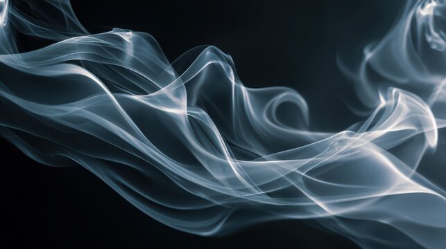 Moody blue-gray smoke wisps weaving through a dark velvet backdrop