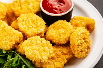 Chicken nuggets fast food natural tasty appetizer fresh delicious gourmet food background on the table rustic top view copy space