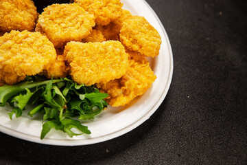 Chicken nuggets fast food natural tasty appetizer fresh delicious gourmet food background on the table rustic top view copy space