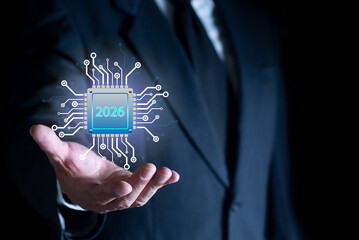 Businessman holding Futuristic 2026 forecast with glowing AI elements. Tech ai analyzing data. Technology artificial intelligence analysis. Ai analyst machine learning.