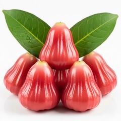 A vibrant stack of rose apples, also known as chomphu or jambu, with their glossy red skin and fresh green leaves isolated on white background