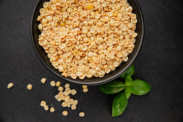 Orecchiette small pasta drum wheat pasta Italian food tasty snack fresh delicious gourmet food table setting rustic top view copy space