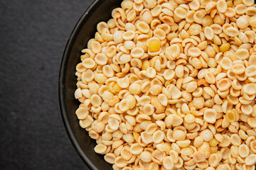 Orecchiette small pasta drum wheat pasta Italian food tasty snack fresh delicious gourmet food table setting rustic top view copy space