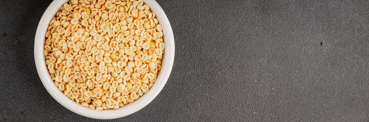 Orecchiette small pasta drum wheat pasta Italian food tasty snack fresh delicious gourmet food table setting rustic top view copy space