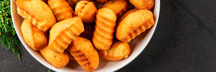 Madeleine sweet biscuit dessert tasty snack fresh delicious gourmet food table setting rustic food top view copy space