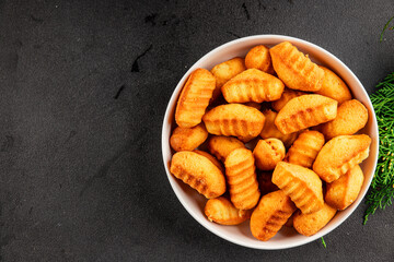 Madeleine sweet biscuit dessert tasty snack fresh delicious gourmet food table setting rustic food top view copy space