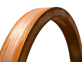 Close-up of a weathered rusty metal ring with surface scratches on a transparent background