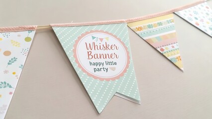 A folded paper banner with pastel colors and party text