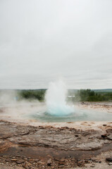 The powerful Stokkur Geyser in Iceland
