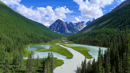 Drone flight over a mountain lake - Shavlinskoye blue lake in Altai