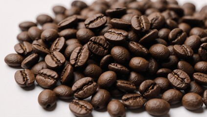 Fototapeta premium Coffee beans in a white background