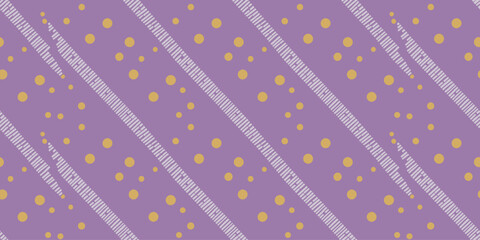 A patterned background with purple base yellow circles and striped diagonal lines across the surface area
