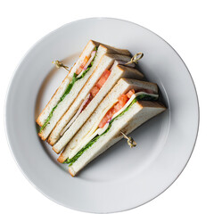 Club Sandwich Cut in Half and Served on a White Plate with Toothpicks Holding Layers Together Overhead Shot Detailed View of Fresh Ingredients
