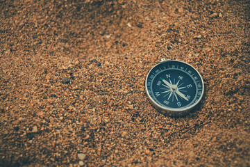 Peaceful summer evening by the sea with a compass guiding the next destination.