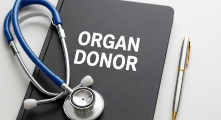 Essential organ donor information with medical stethoscope and elegant pen.
