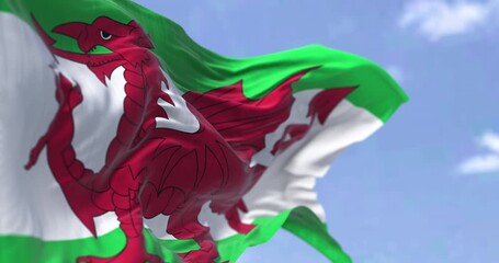 The Wales flag waving in the wind on a clear day